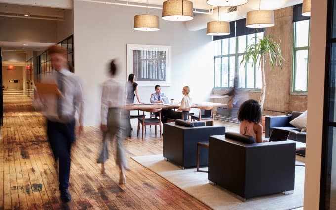 img_business-people-at-work-in-a-busy-office-space-680x425